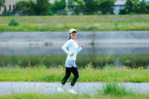 healthy woman running outdoors