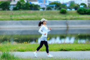 healthy woman running outdoors